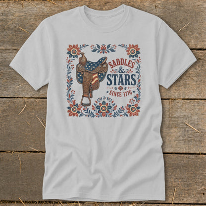 T-shirt with distressed graphic of saddle, Stars & Stripes, and "Since 1776".