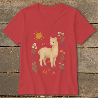 Red v-neck t-shirt with a cream alpaca and floral illustration.
