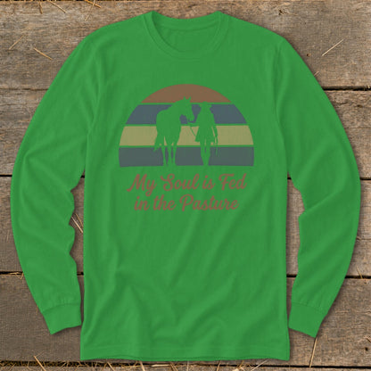 Green long-sleeve shirt with "My Soul is Fed in the Pasture" text and horse graphic.