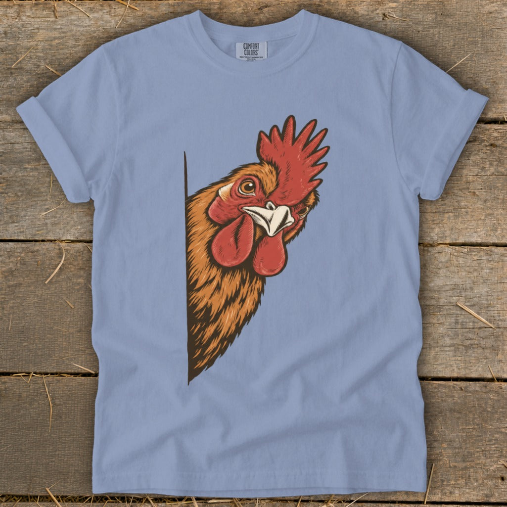 Light blue t-shirt with a rooster peeking from the side.