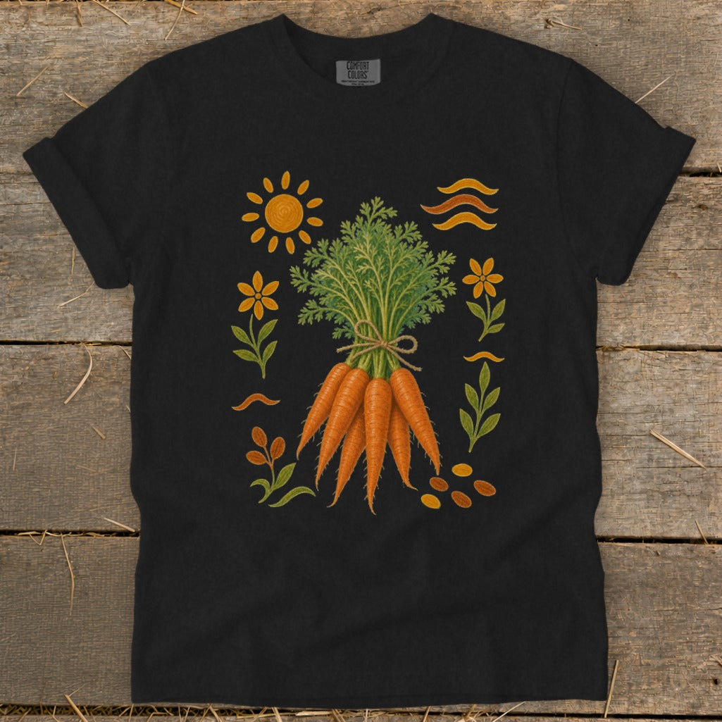 Black t-shirt with a graphic of a bunch of carrots surrounded by floral elements and a sun.