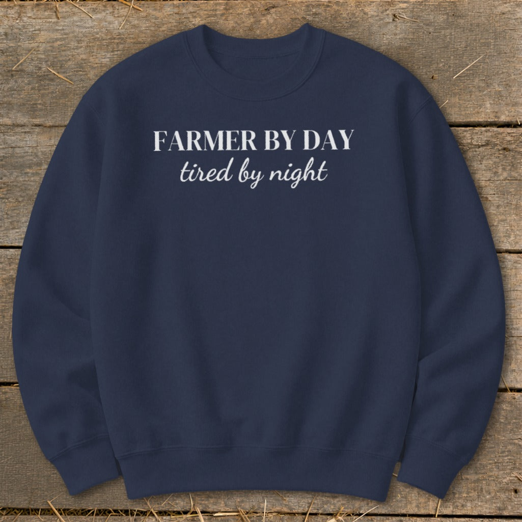 Navy sweatshirt with "FARMER BY DAY tired by night" text