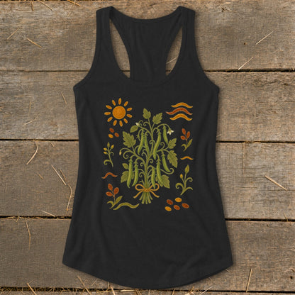 Black tank top with a botanical print of pea pods and sun motifs.