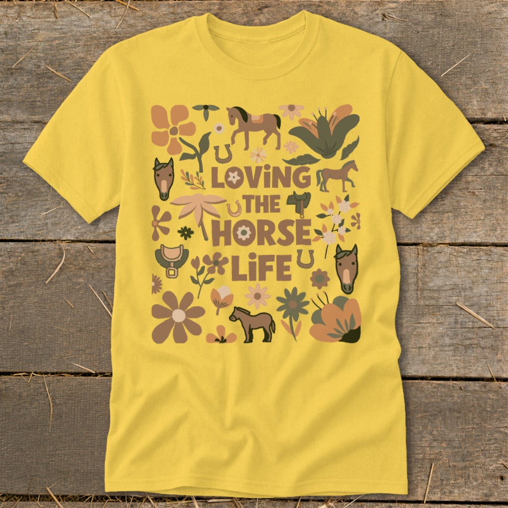 Yellow t-shirt with "Loving the Horse Life" text and horse-themed graphics.