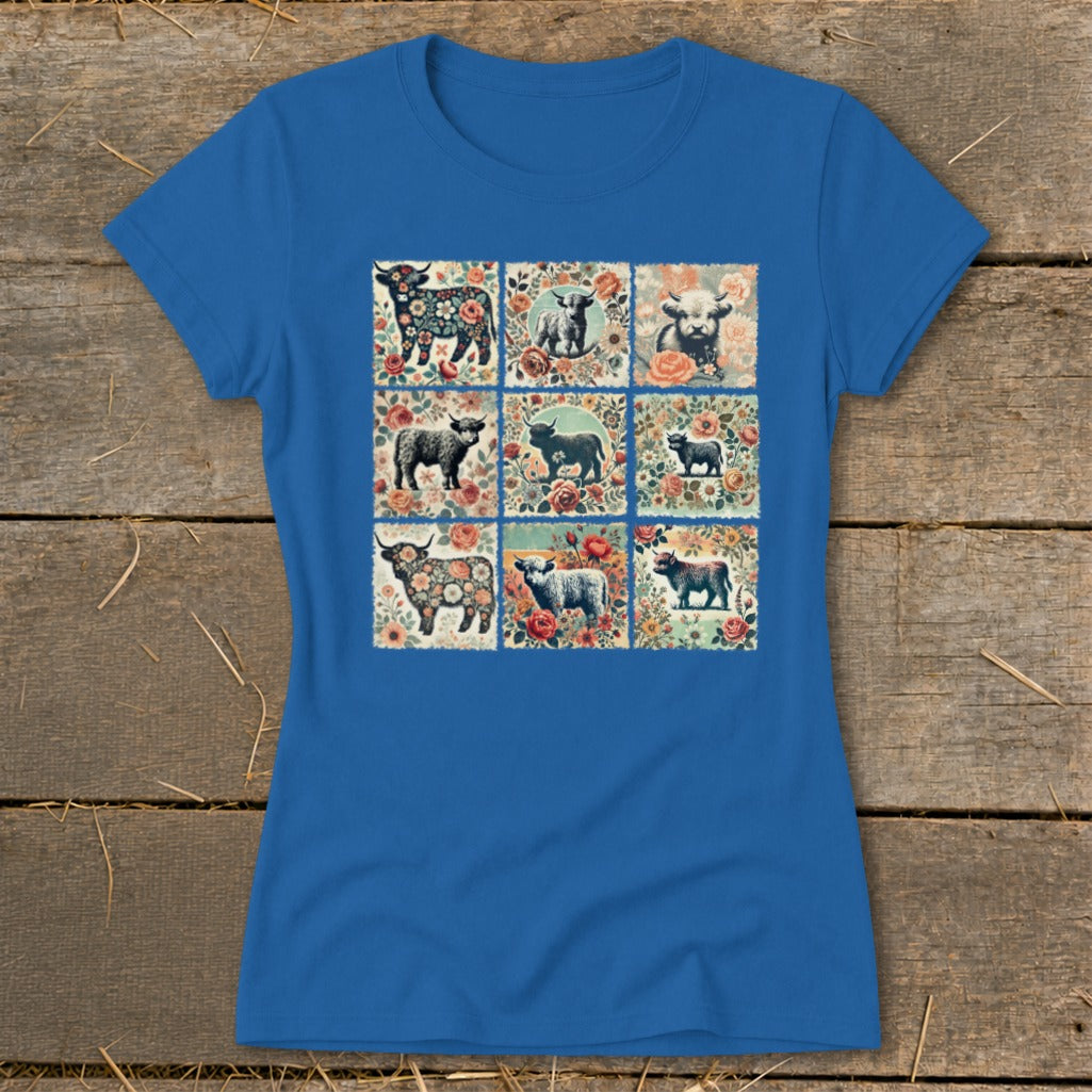 Royal blue t-shirt with a nine-panel print of Highland cows and floral designs.