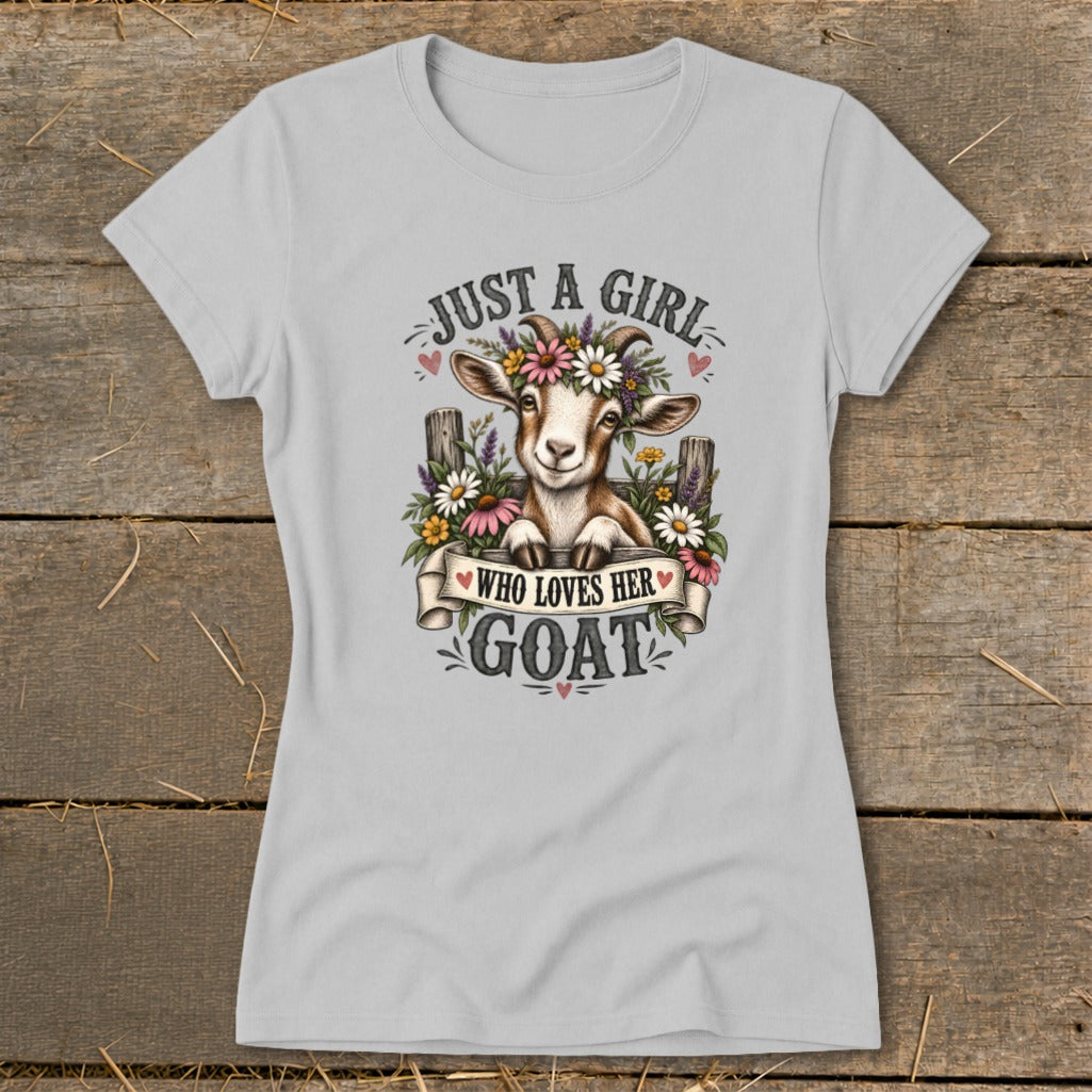 Light gray t-shirt with a goat wearing a flower crown and text "Just a girl who loves her goat".