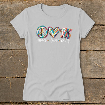 Light grey t-shirt with colorful peace, heart, and cow graphic and text "peace love cows".