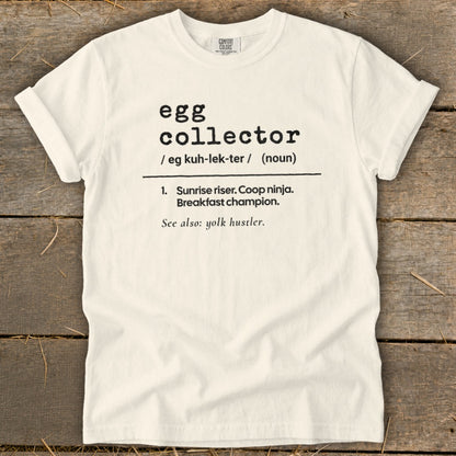 White t-shirt with "egg collector" definition and "yolk hustler" joke.