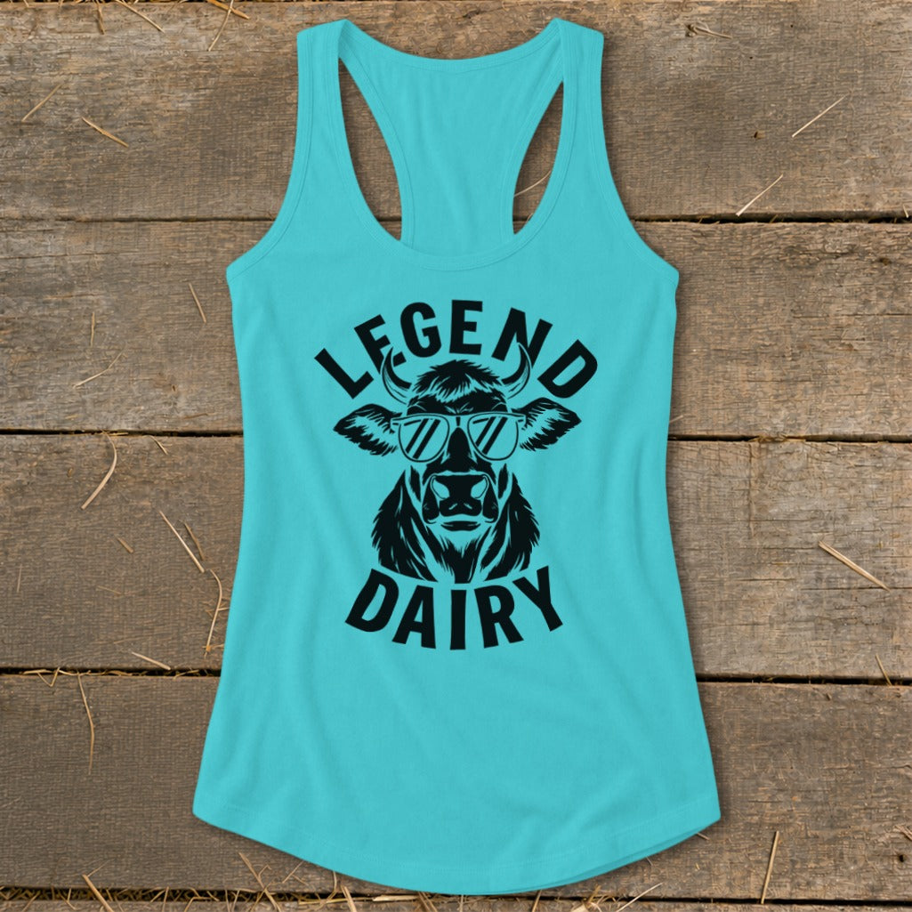 Teal tank top with black graphic of a cow wearing sunglasses and text "LEGEND DAIRY".