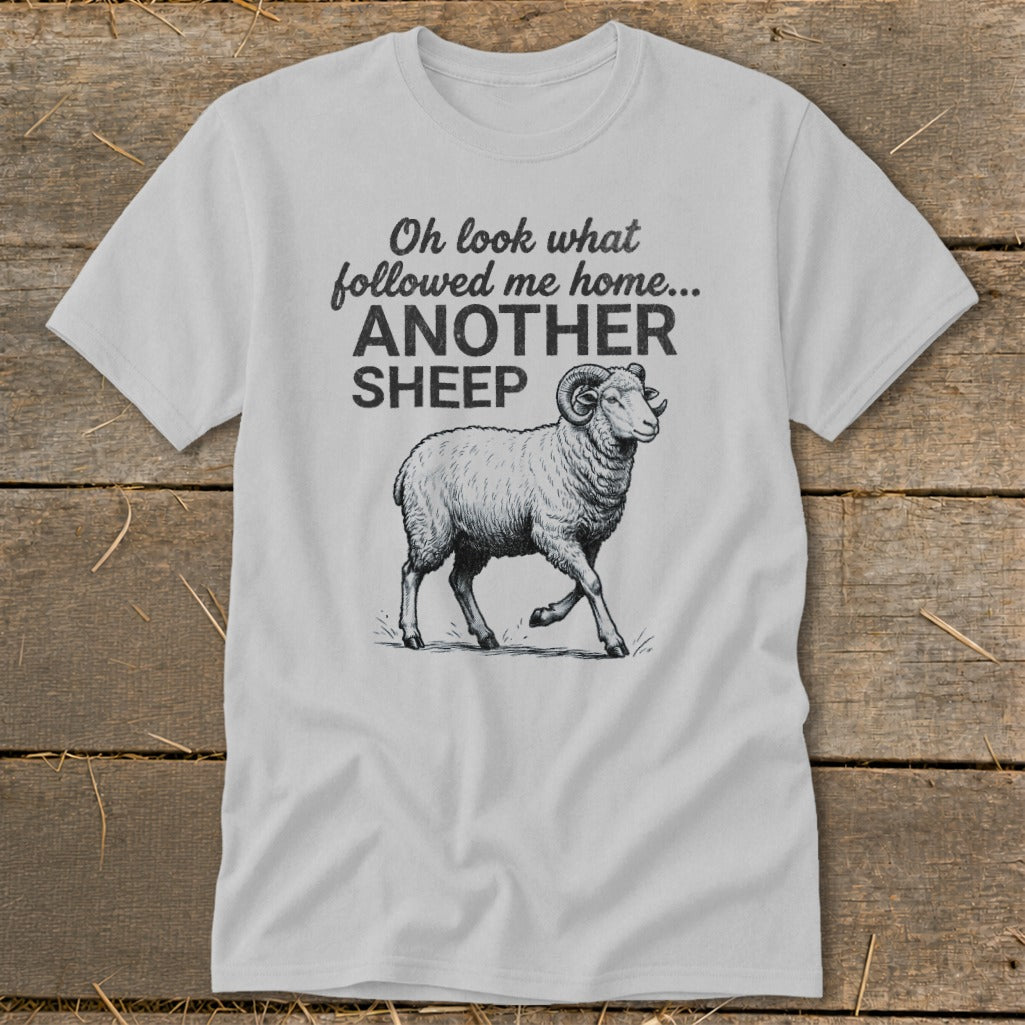 Grey t-shirt with text "Oh look what followed me home... ANOTHER SHEEP" and a sheep illustration.