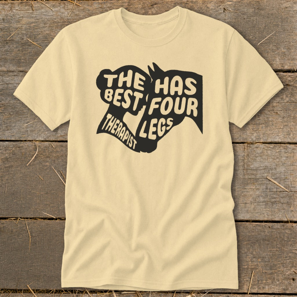 Cream t-shirt with black text and horse head graphic that reads "The therapist has four legs".