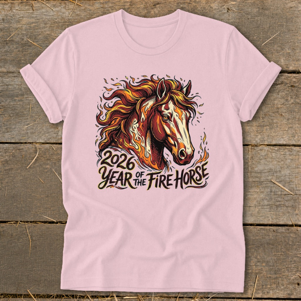 Pink t-shirt with graphic of a fiery horse head and text "2026 Year of the Fire Horse".