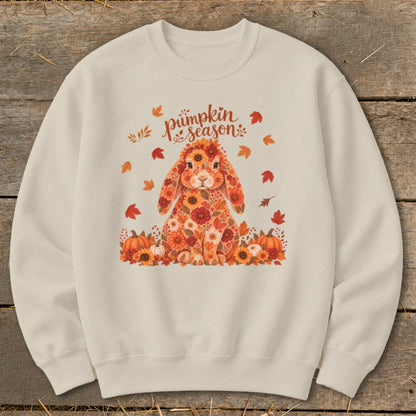 Light beige crewneck sweatshirt with a floral bunny and pumpkins design, reads "pumpkin season".