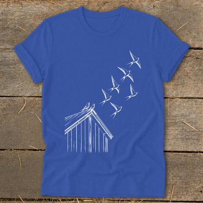 Royal blue t-shirt featuring a white line graphic of birds flying up from a shed roof.