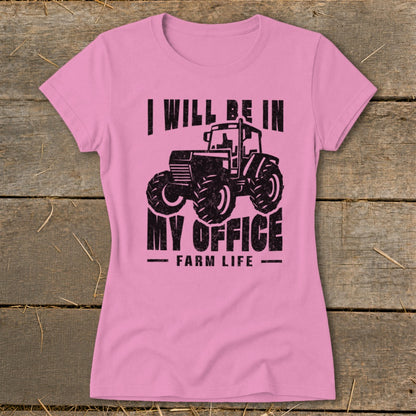 Pink t-shirt with black graphic of tractor and text "I will be in my office Farm Life".