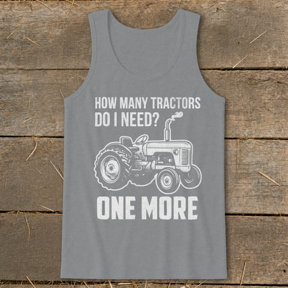 Grey tank top with white text and tractor graphic: "How Many Tractors Do I Need? One More"