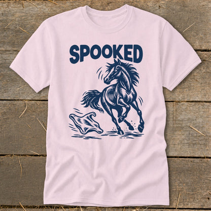 Pink t-shirt with navy blue graphic of a horse running from a ghost, text SPOOKED.