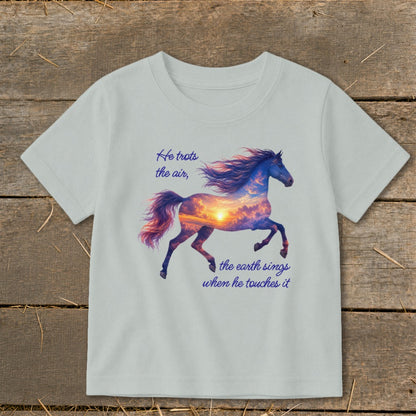 A light gray short-sleeve t-shirt featuring a running horse graphic filled with a sunset sky and inspirational text.