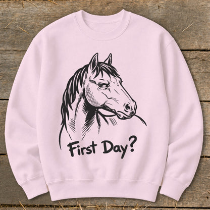 Light pink sweatshirt with a black sketch of a horse's head and text "First Day?".