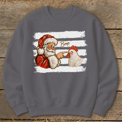 Santa boops a chicken with the word "Boop" written between them.