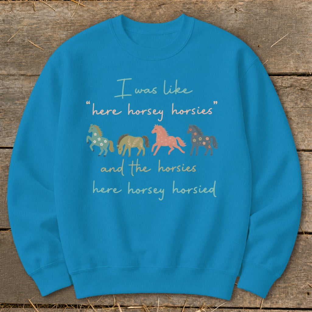 Blue sweatshirt with horses and text: "I was like 'here horsey horsies' and the horsies here horsey horsied"