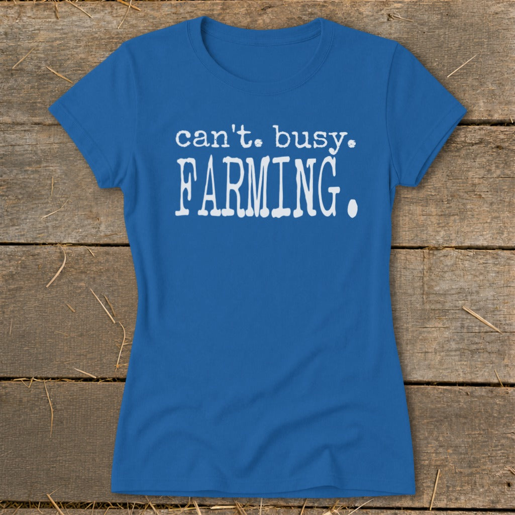 Blue t-shirt with white text "can't. busy. FARMING."