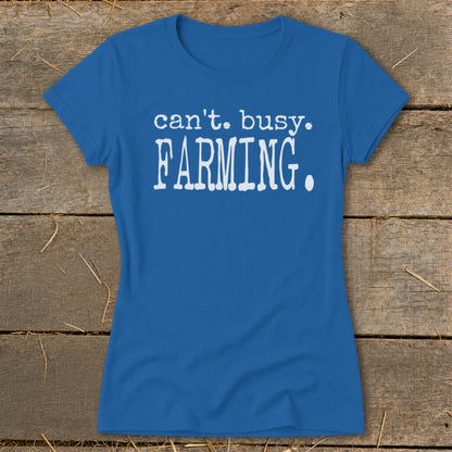 Blue t-shirt with white text "can't. busy. FARMING."