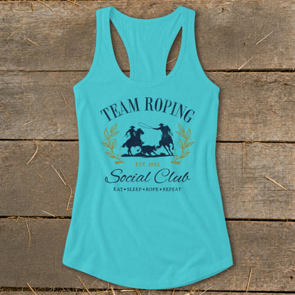 Turquoise tank top with "Team Roping Social Club" graphic and rodeo imagery.