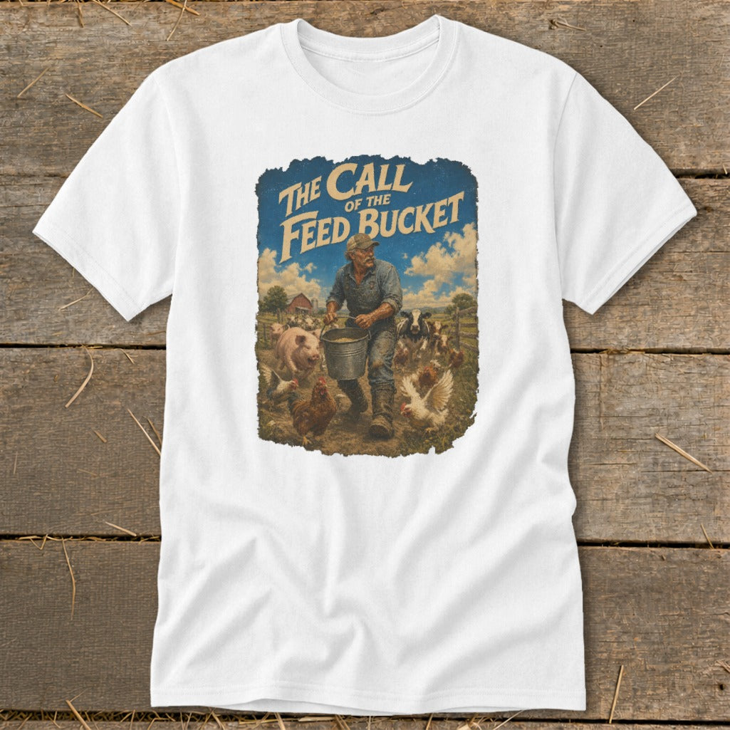 White t-shirt with graphic of farmer feeding pigs, chickens, and cows with text "The Call of the Feed Bucket".