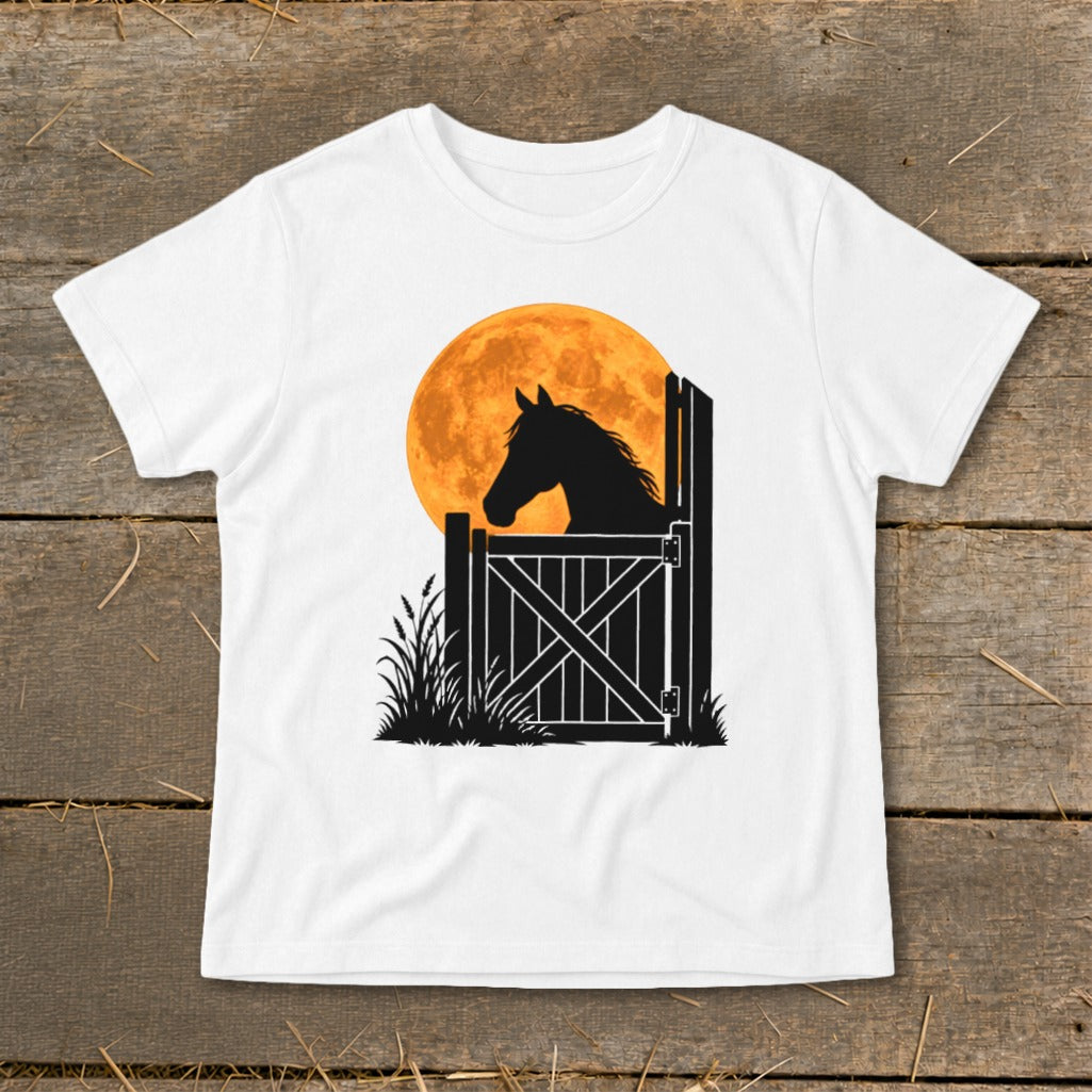 A white crewneck t-shirt featuring a graphic of a horse silhouette looking over a stable door against a large orange moon.