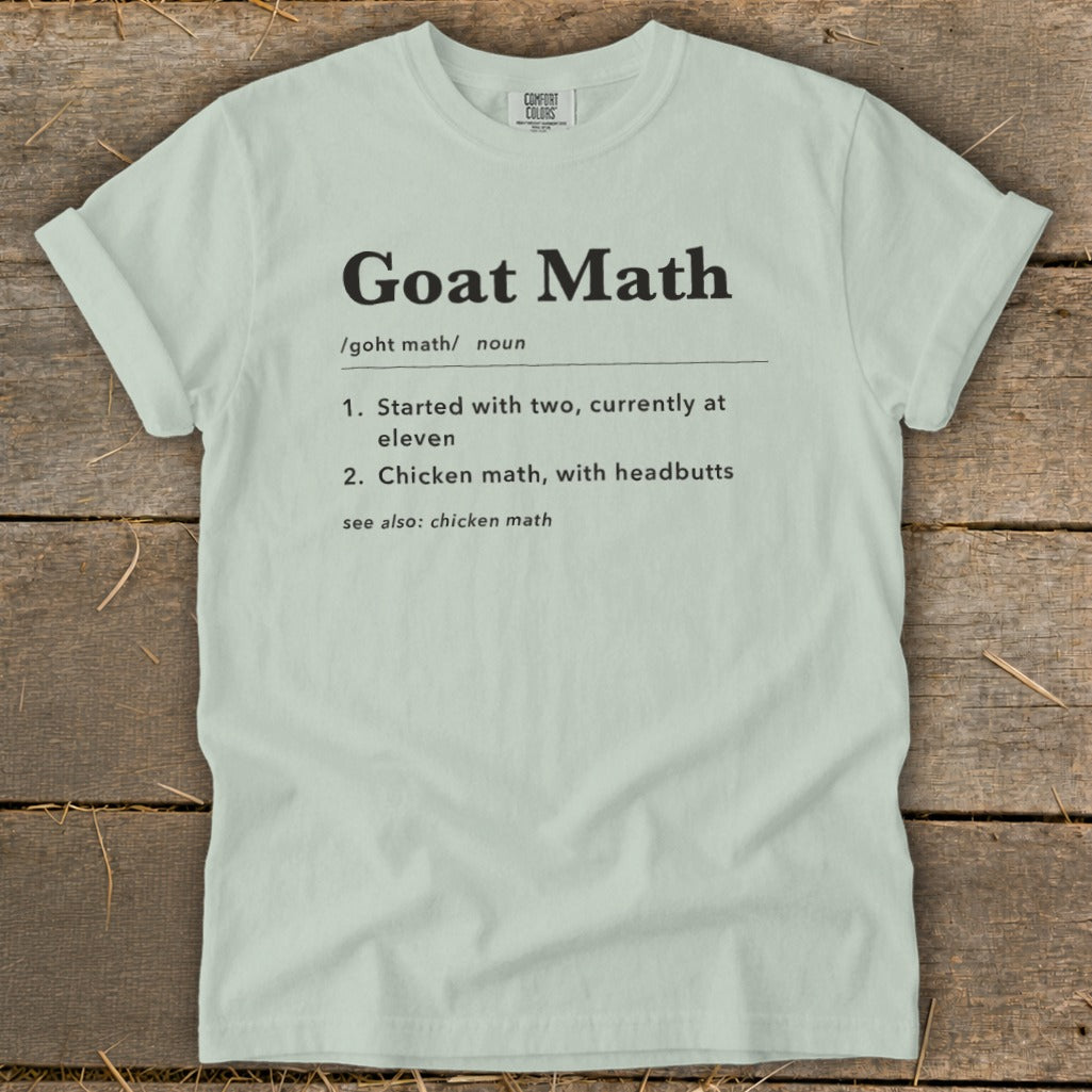 Light green t-shirt with "Goat Math" definition printed in black text.