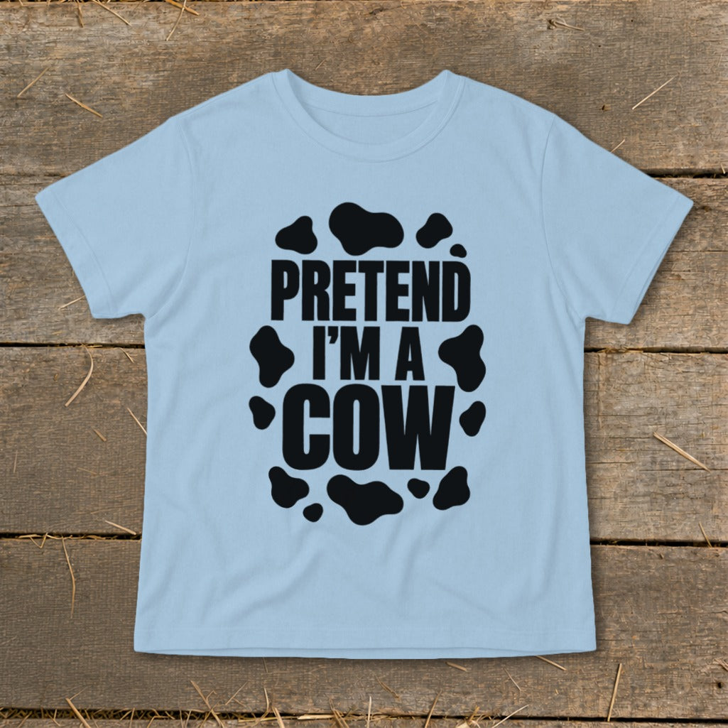 Light blue t-shirt with "PRETEND I'M A COW" and cow spots design.