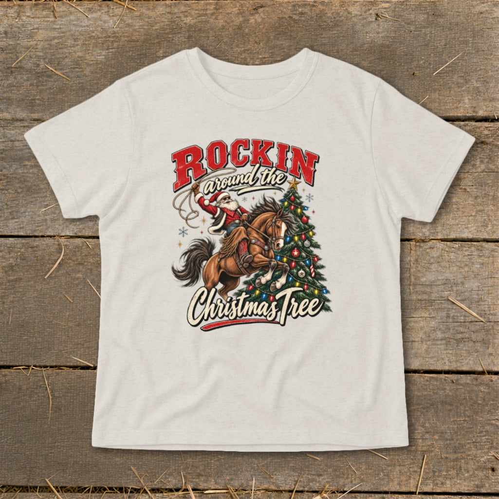 Santa on a horse lassoing near a Christmas tree with text "Rockin Around the Christmas Tree."
