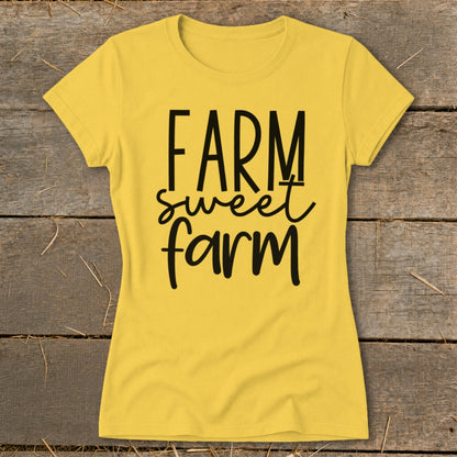 Yellow t-shirt with black text reading "FARM sweet farm".
