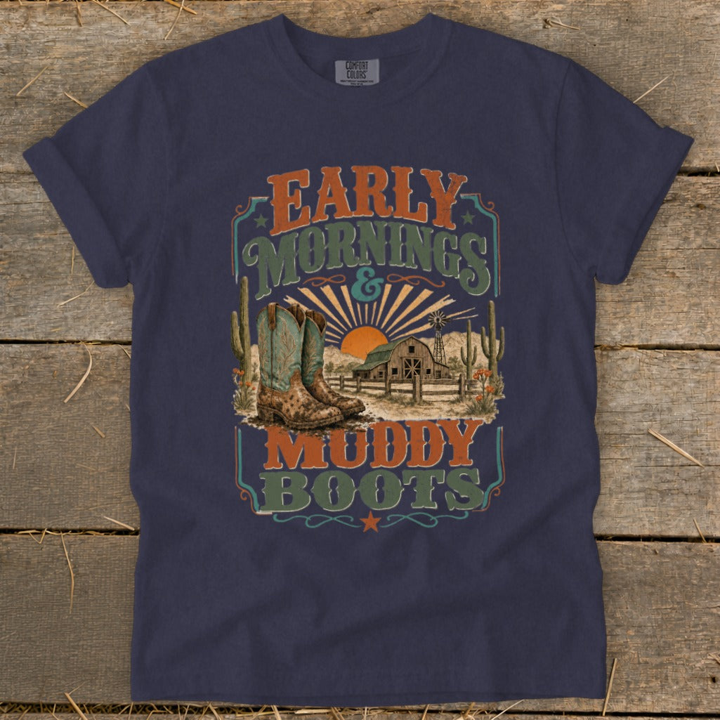 Navy t-shirt with "Early Mornings & Muddy Boots" graphic featuring cowboy boots, barn, and desert landscape.
