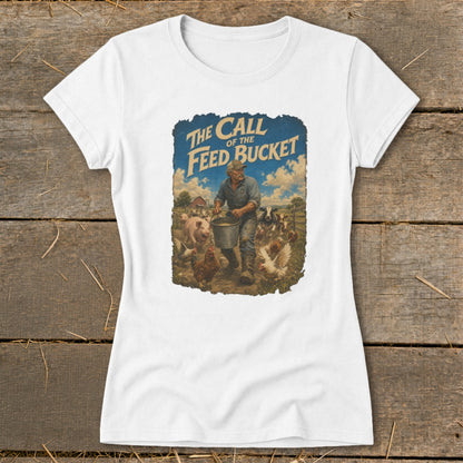White t-shirt with "The Call of the Feed Bucket" text and farm illustration.