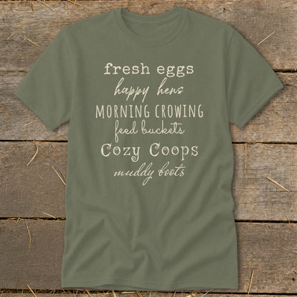 Olive green t-shirt with white text listing farm life phrases.