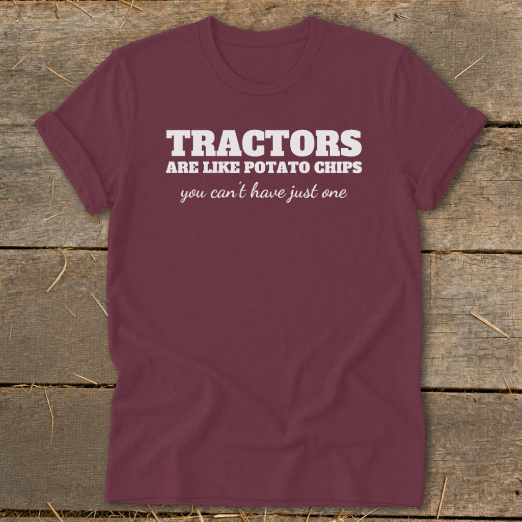 Maroon t-shirt with white text that reads "Tractors are like potato chips, you can't have just one."