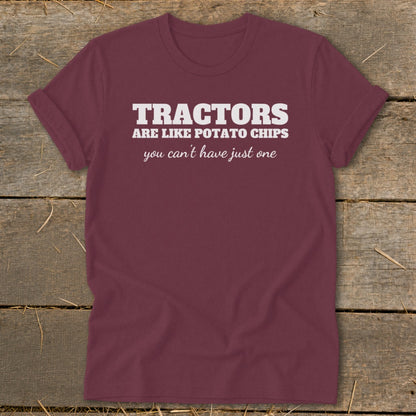 Maroon t-shirt with white text that reads "Tractors are like potato chips, you can't have just one."