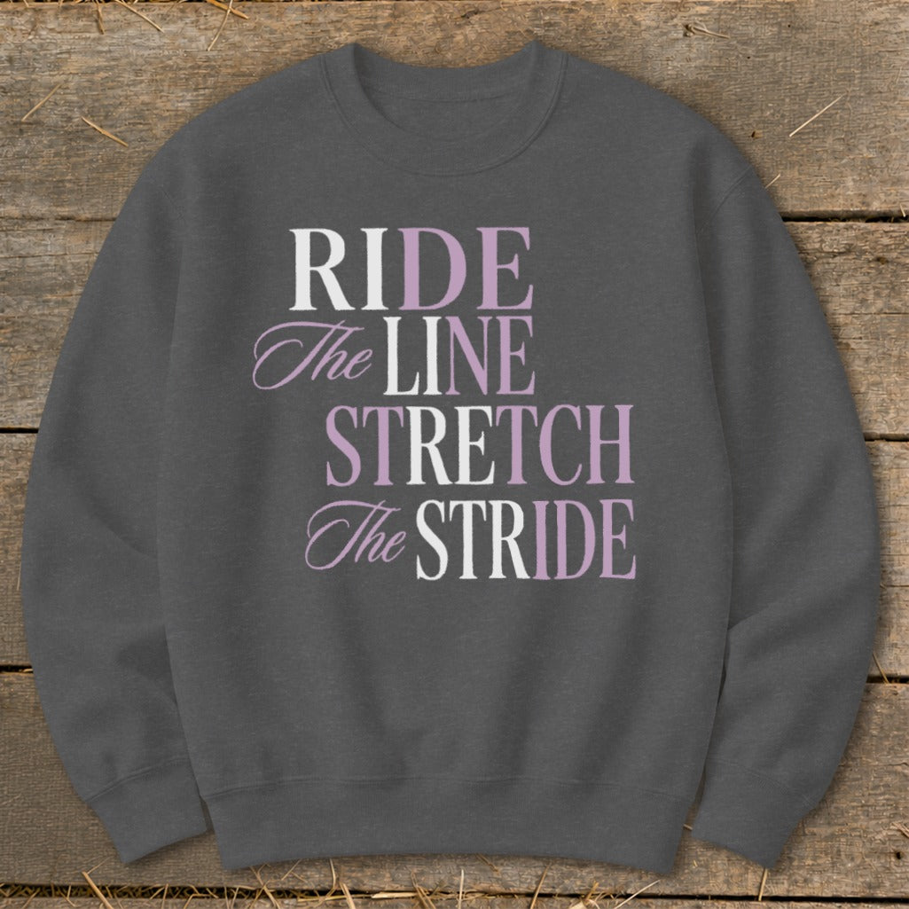 Dark gray sweatshirt with text "RIDE The LINE STRETCH The STRIDE".