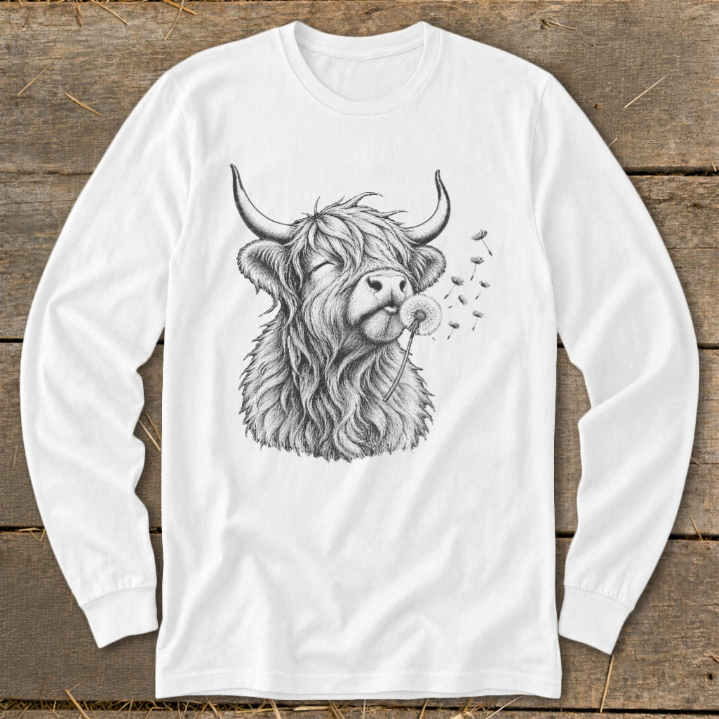Long sleeve white t-shirt with a sketch of a Highland cow blowing a dandelion.