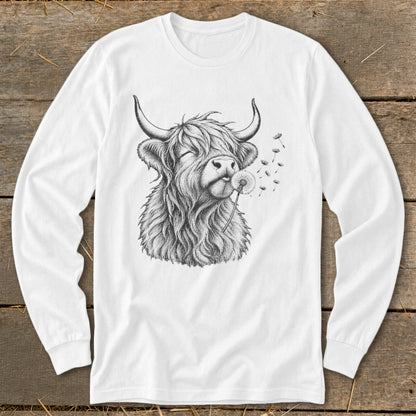 Long sleeve white t-shirt with a sketch of a Highland cow blowing a dandelion.