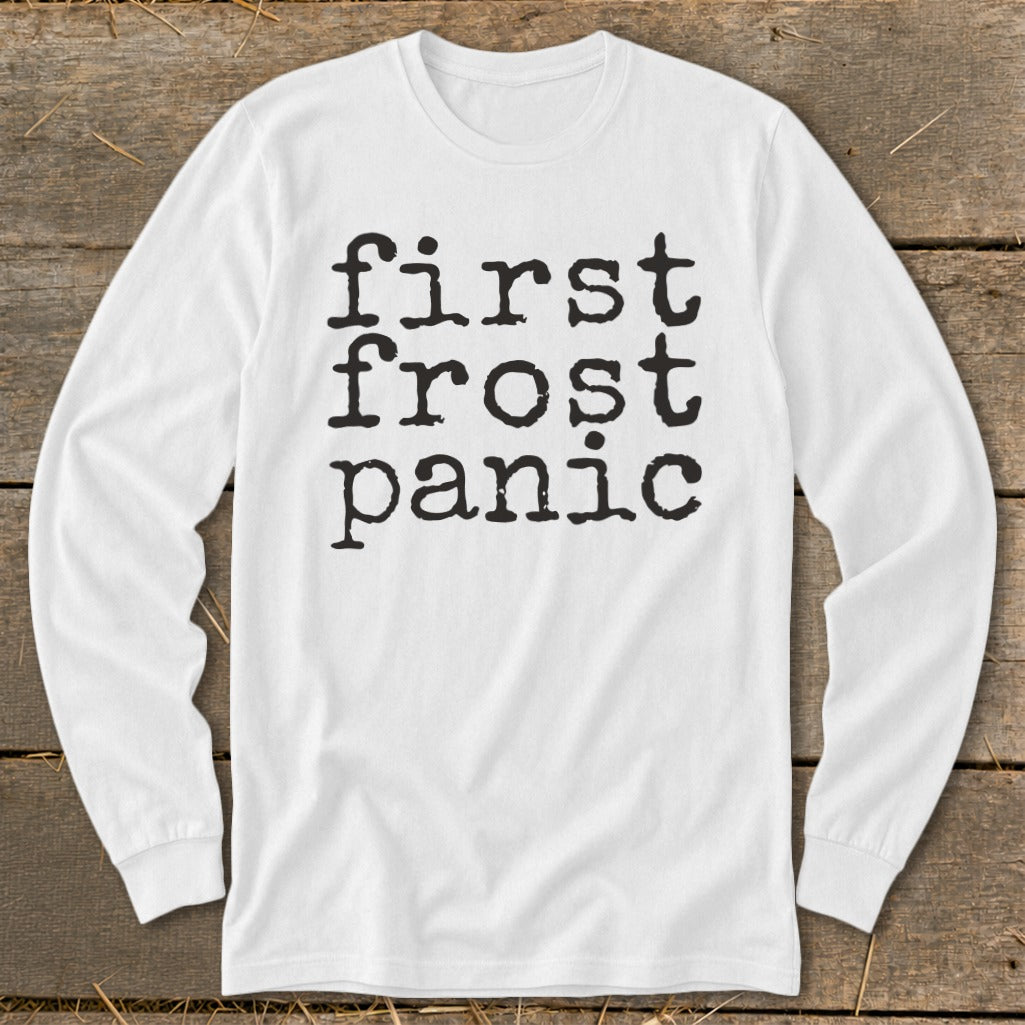 White long sleeve shirt with "first frost panic" printed in black, typewriter-style font.