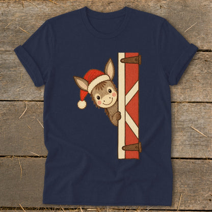 Navy t-shirt with a cute donkey wearing a Santa hat peeking from a barn door.