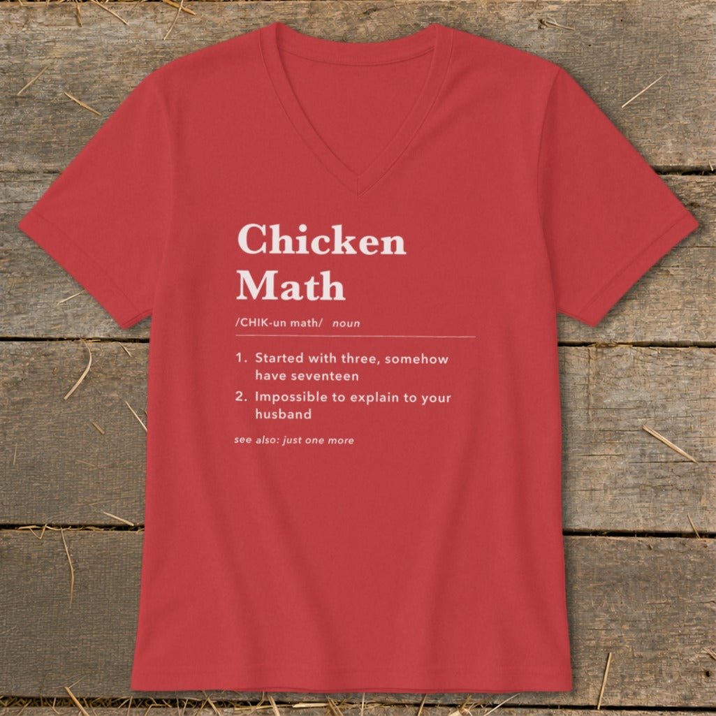 Red v-neck t-shirt with "Chicken Math" definition printed in white text.