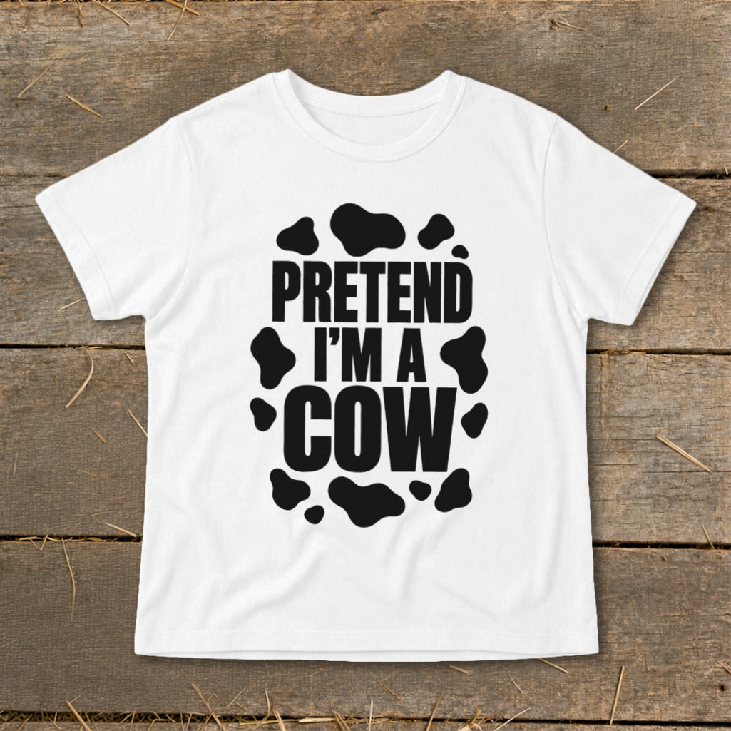 White t-shirt with black "Pretend I'm a Cow" text and cow spots.
