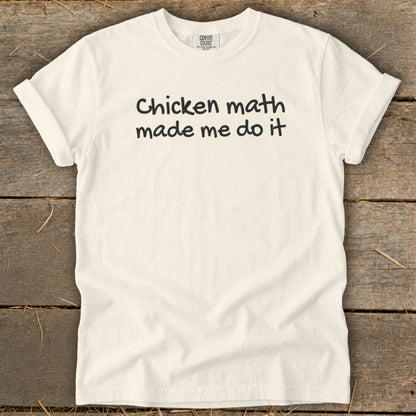 Cream t-shirt with black text that reads "Chicken math made me do it."