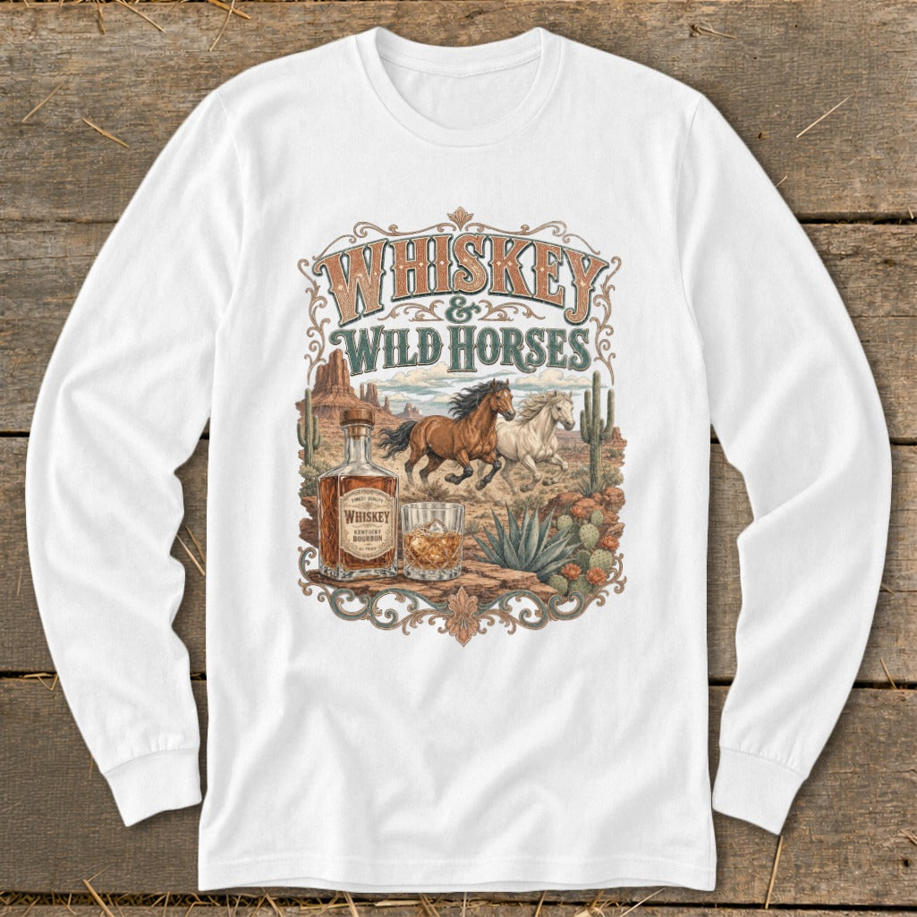 Whiskey & Wild Horses graphic on a white long-sleeve shirt with a desert scene.