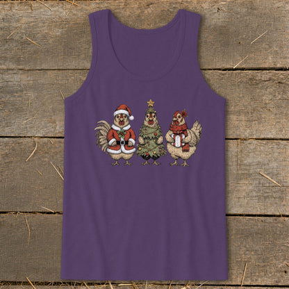 Three chickens in Christmas attire, including Santa suit, tree costume, and gift.