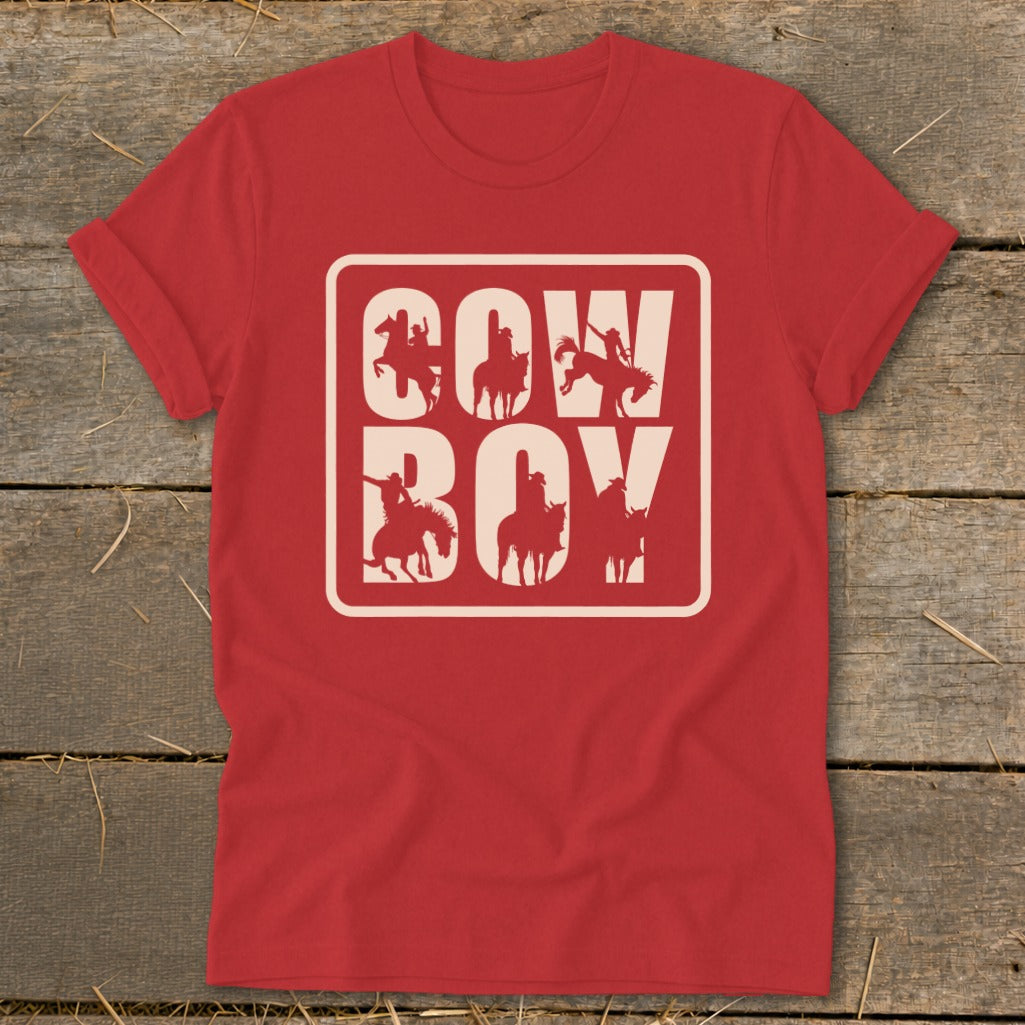 Red t-shirt with "Cowboy" text and silhouette riders within a rounded rectangle.